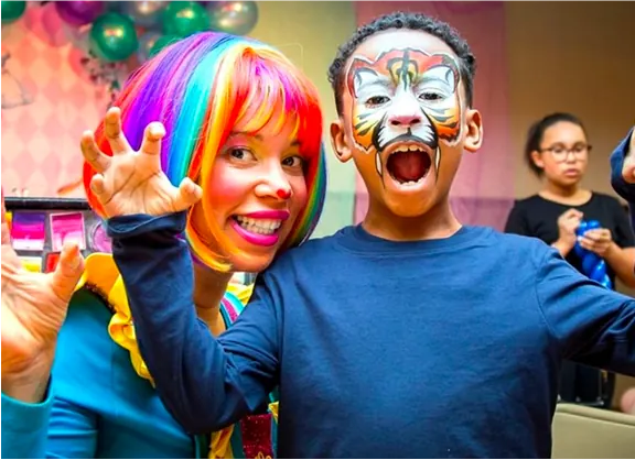 Johie the Clown with the birthday boy.